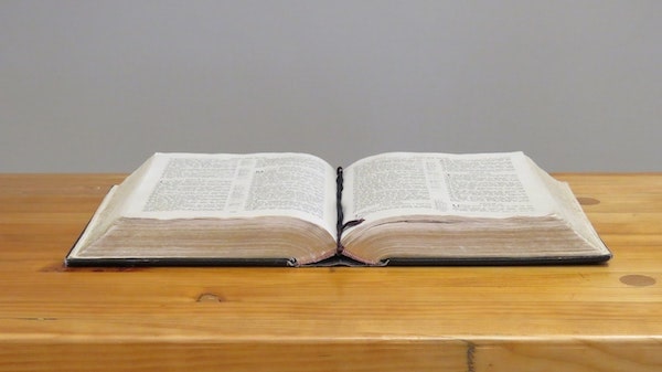 Open Bible book on the table