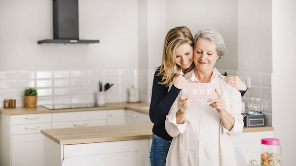 Mom and daughter chatting happily