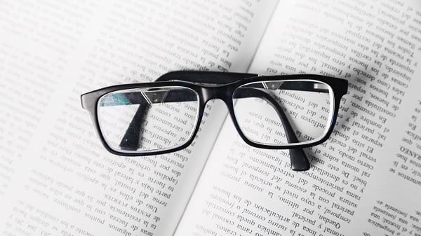 glasses on the book