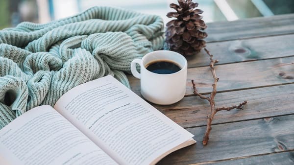 A book and a cup of coffee