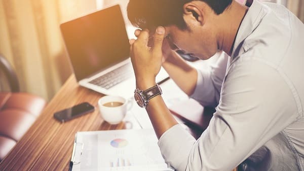 The businessman feels extremely distressed