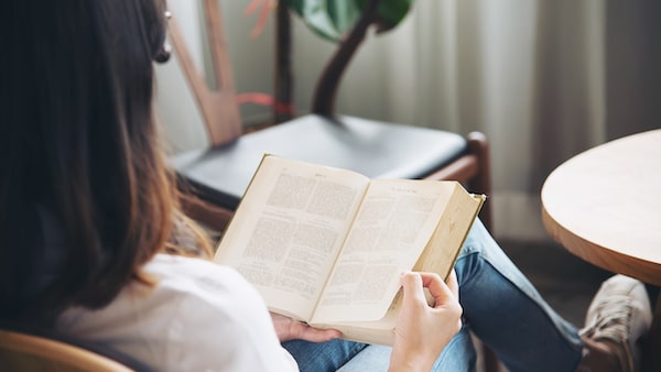Woman reading the words of God