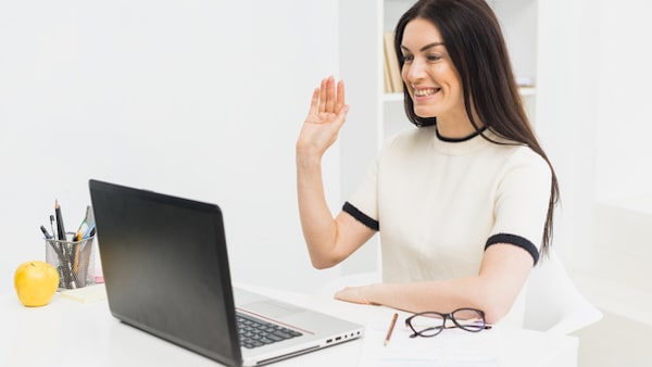 A woman is making a video call